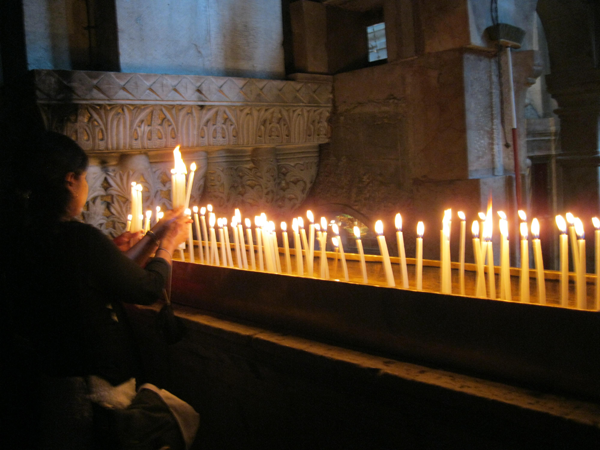 Laying Candles In The Holy Citadel In The Old City Of Jerusalem