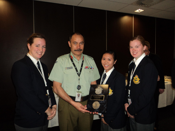 The Canadians presenting a plaque to the Chief of Defence.